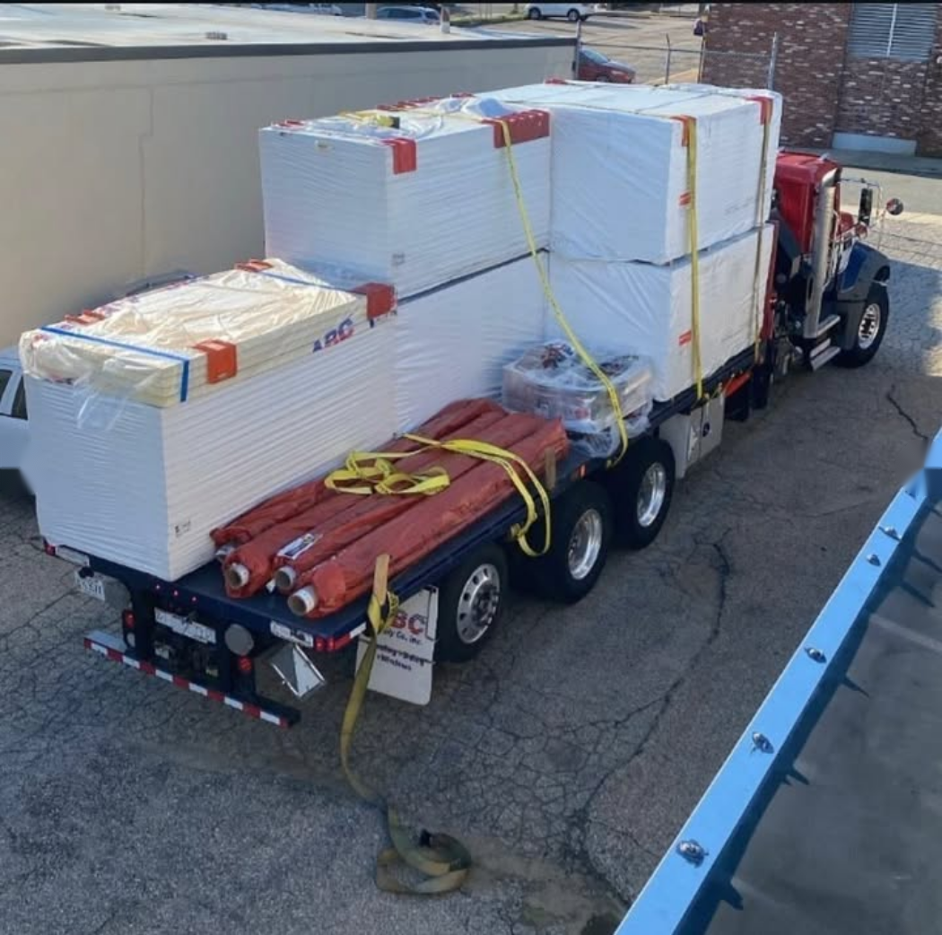Roofing materials staged for a Massachusetts roofing project
